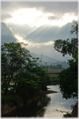 Light streaming over the hills by Mai Chau.