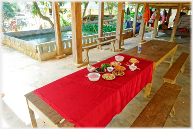 A table laid with a meal for two people.