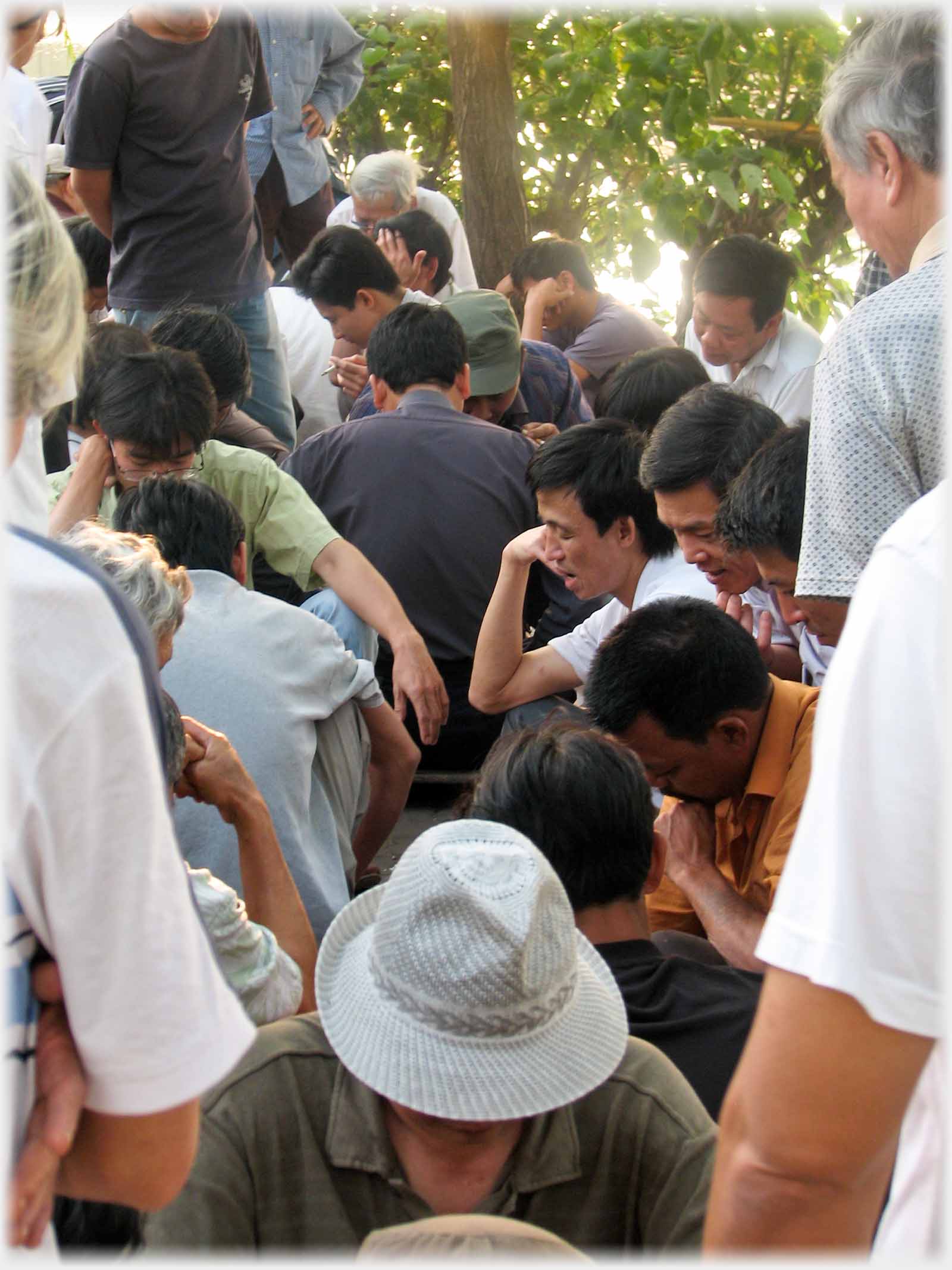 Tightly packed group looking down - board not visitble.