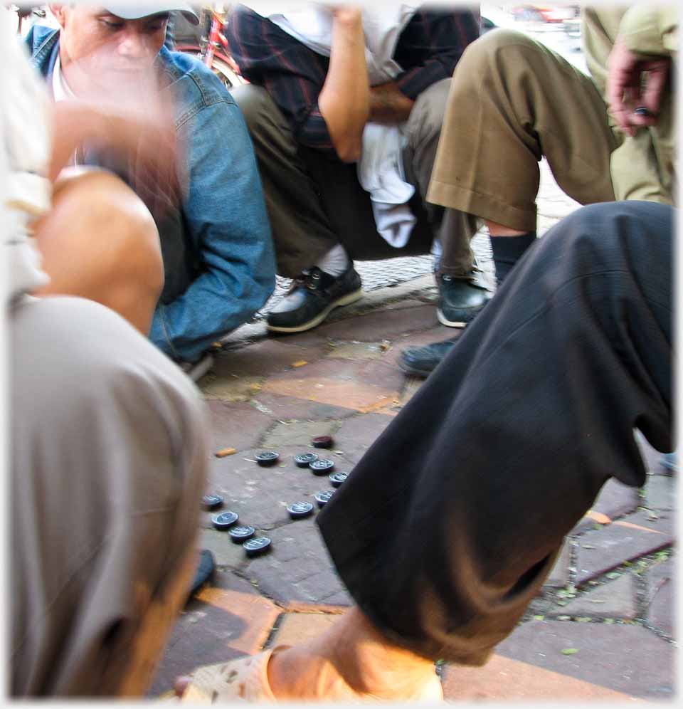 Legs and pieces on paving.